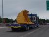 a-matching-pete-and-trailer-haul-mining-shovel-from-the-factory